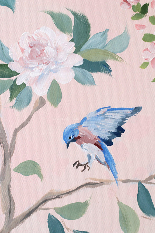 A bluebird flies near pink and white flowers on a light pink background by Elizabeth Alice Studio.