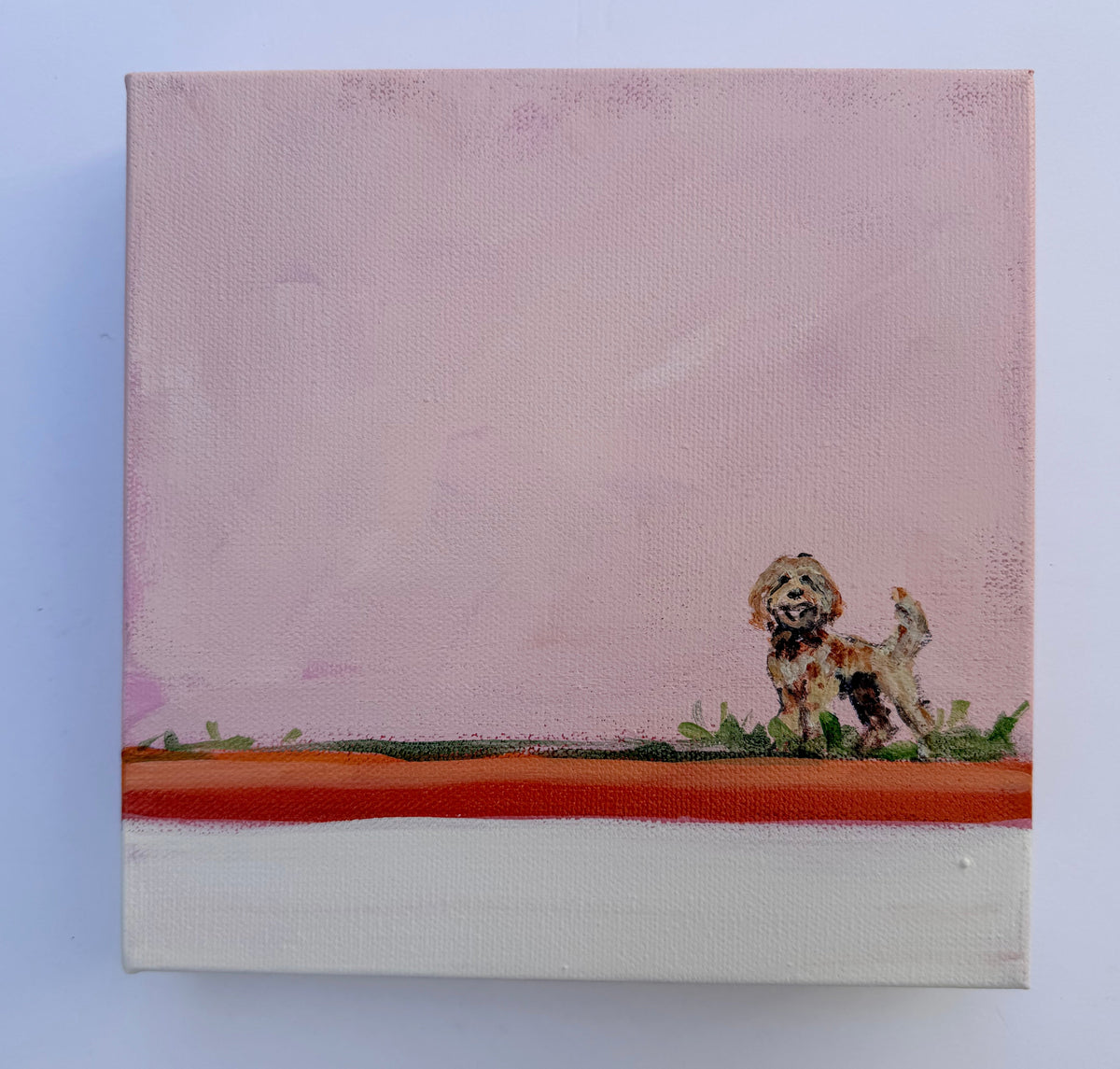 Original acrylic painting of a small brown dog standing in grass against a pink background.
