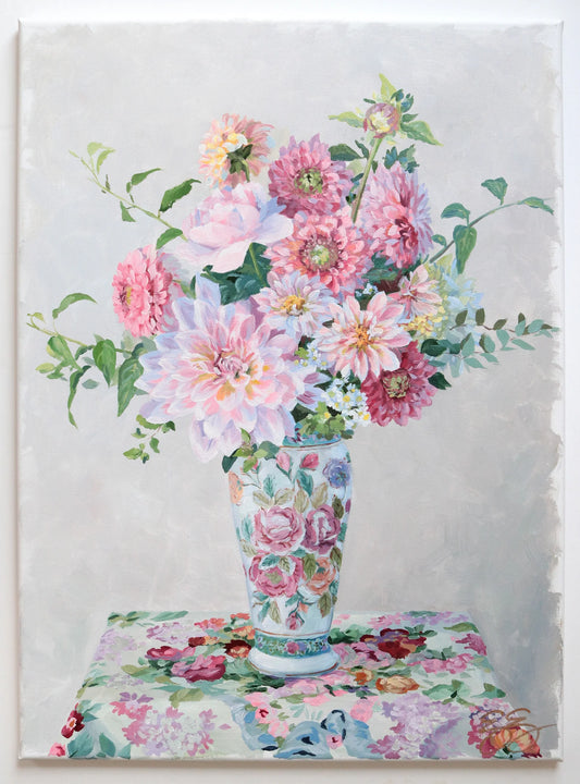 Elizabeth Alice acrylic on canvas: vintage vase with pink and white flowers atop a floral tablecloth.
