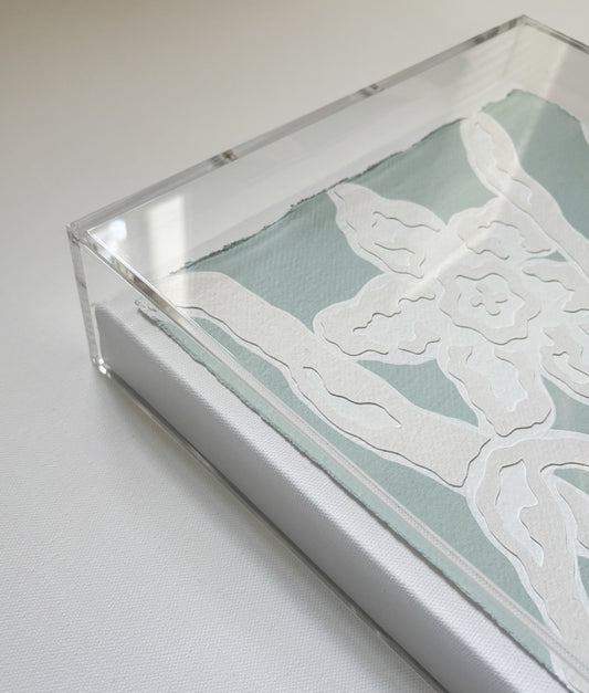 Abstract white floral art by Kendal Blanchard Art on handmade cotton paper, light blue background, in acrylic box frame.