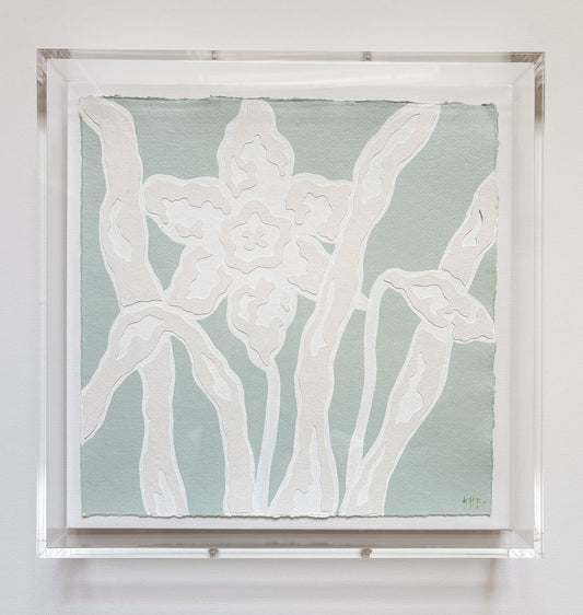 Kendal Blanchard Art: White daffodils and leaves on pale green rag paper, in an acrylic box frame.
