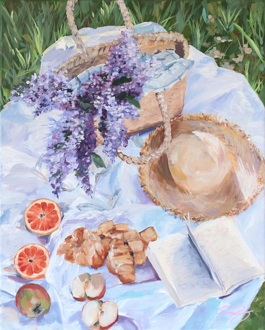 Elizabeth Alice acrylic on canvas: picnic scene with lilacs, fruit, pastries, a straw hat, basket & book on white cloth.