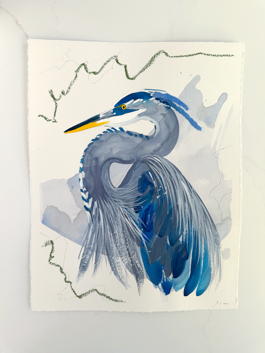 Mixed media watercolor painting of a great blue heron with a long yellow beak and detailed blue plumage.