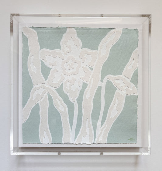 Kendal Blanchard Art handmade cotton rag paper collage of white daffodils on blue, in a clear acrylic box frame.