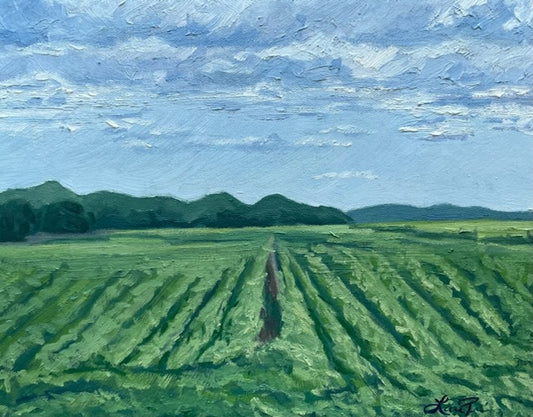 Lauri Prins original oil on canvas, 11x14: green field with crops, distant trees, and a soft blue sky.