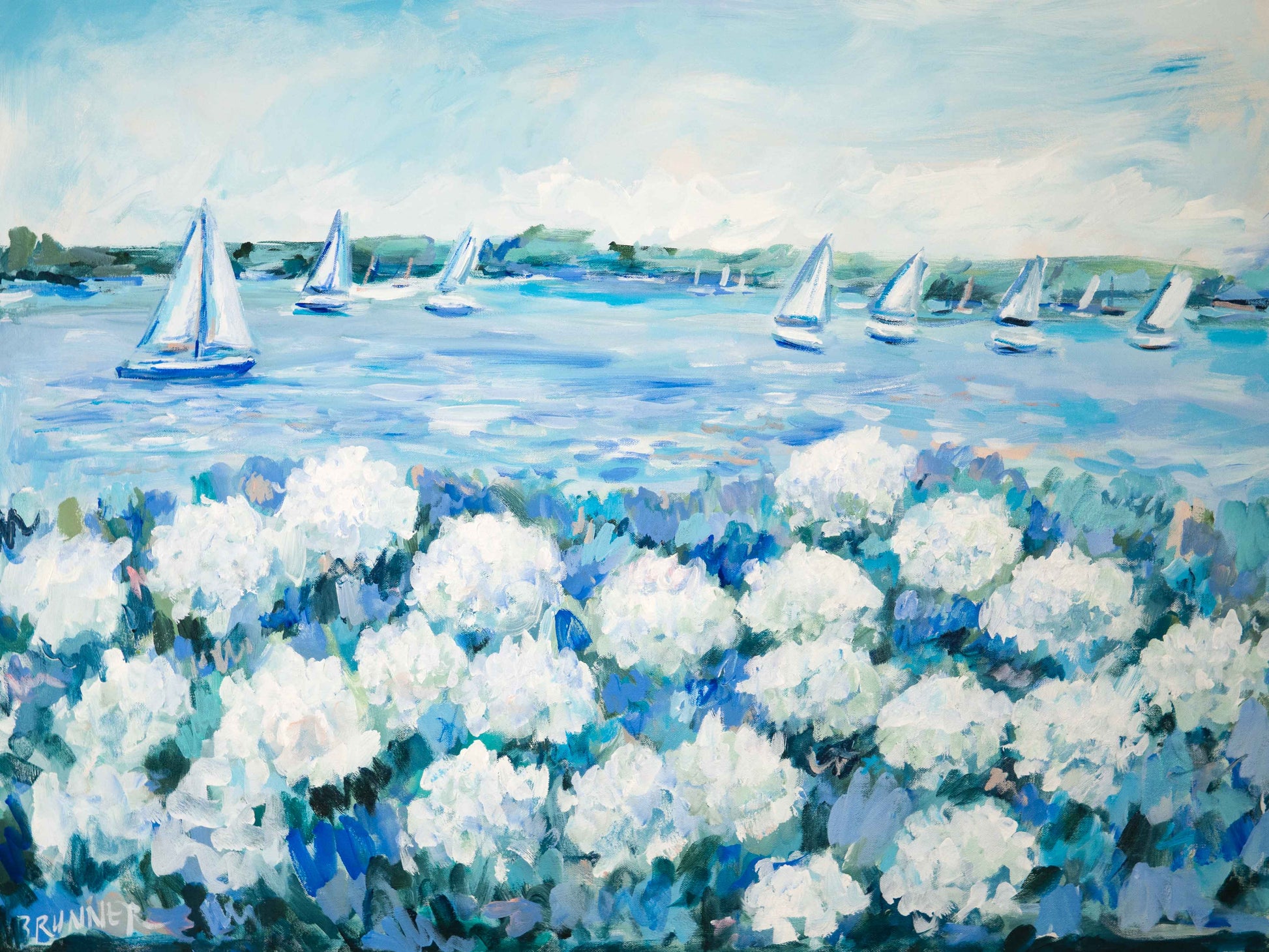 Michelle Brunner coastal decor with white sailboats, summer hydrangeas, and a green shoreline on a blue lake.