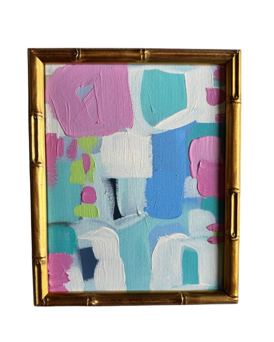Kelsey Nichols Art framed acrylic painting with pink, blue, green, and white brushstrokes in a gold bamboo-style frame.
