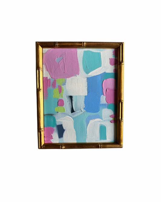 Abstract acrylic painting by Kelsey Nichols Art features pink, blue, teal & white blocks in a gold bamboo-style frame.