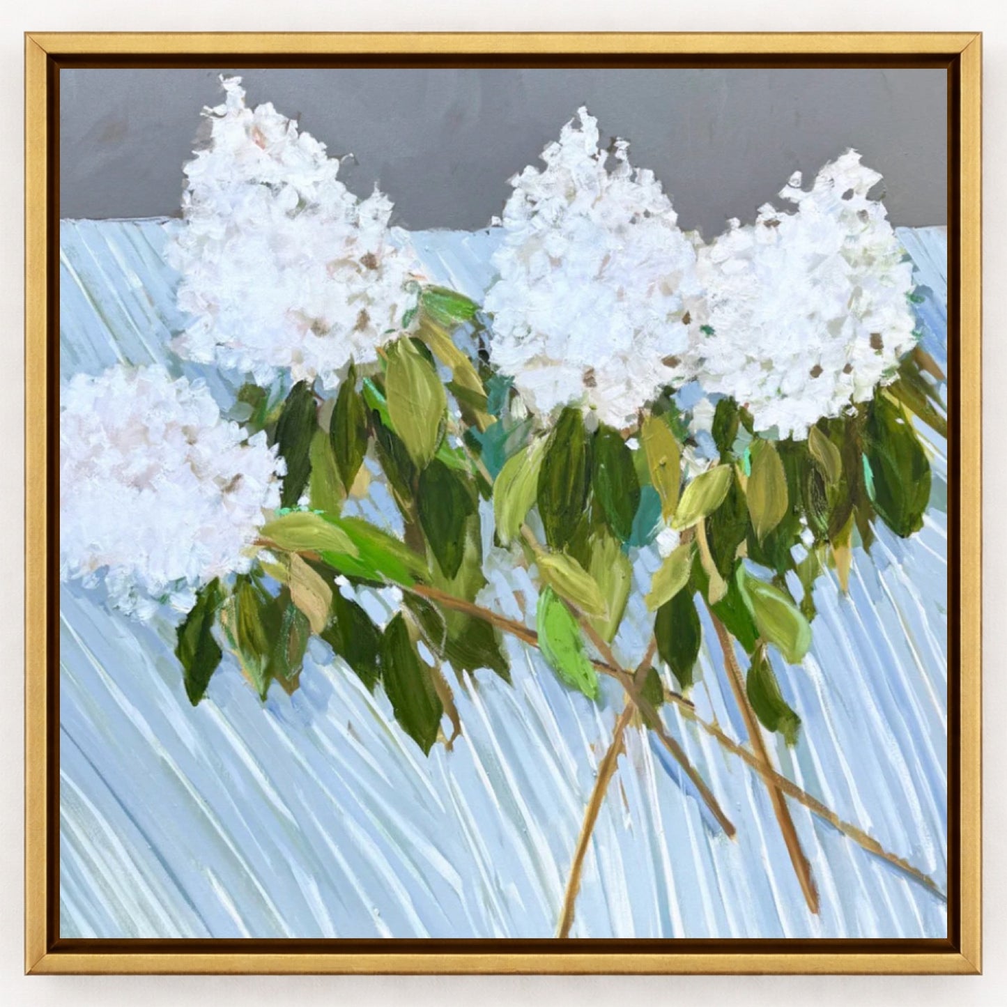 Shannon Woodford square wall art with white hydrangeas and green leaves on a blue and white striped background.
