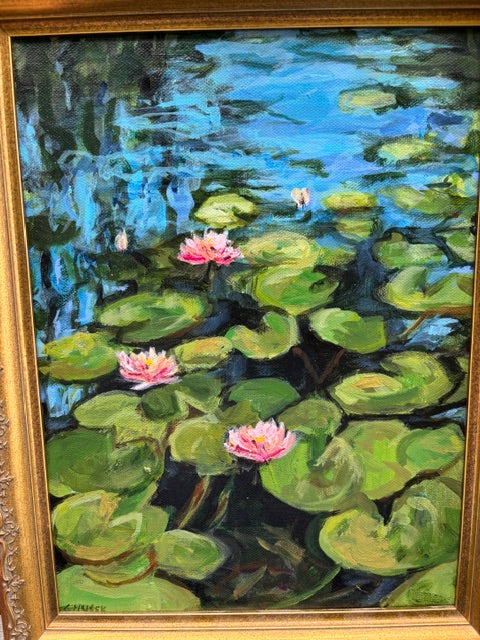 Catherine Husek oil on canvas: pink water lilies and green lily pads on a blue pond, framed artwork.