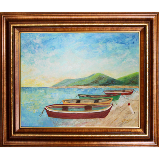 Framed painting of rowboats on a beach with calm water, distant hills, and a cloudy sky.