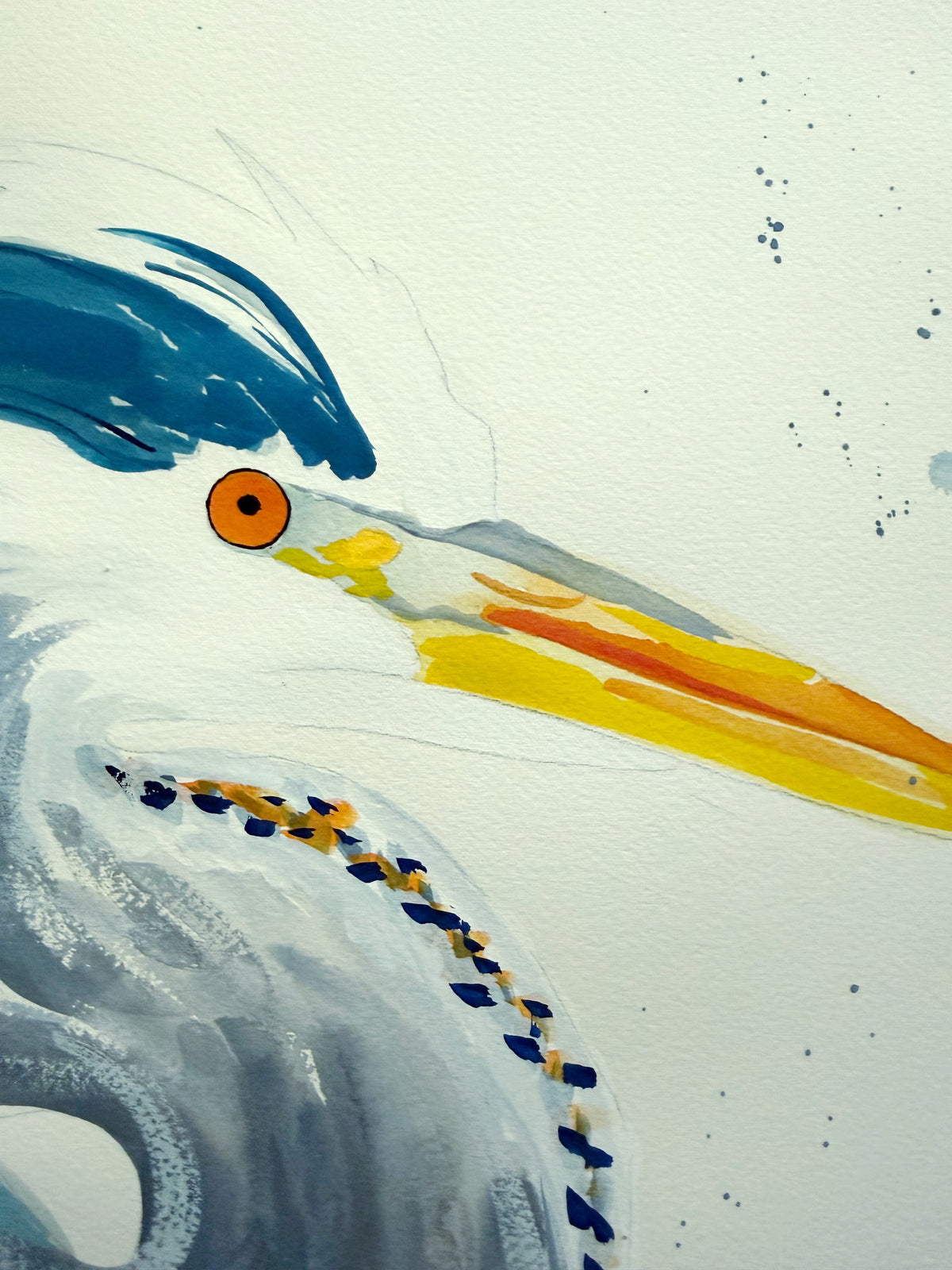 Close-up watercolor painting of a contented Great Blue Heron with a long yellow beak and an orange eye.