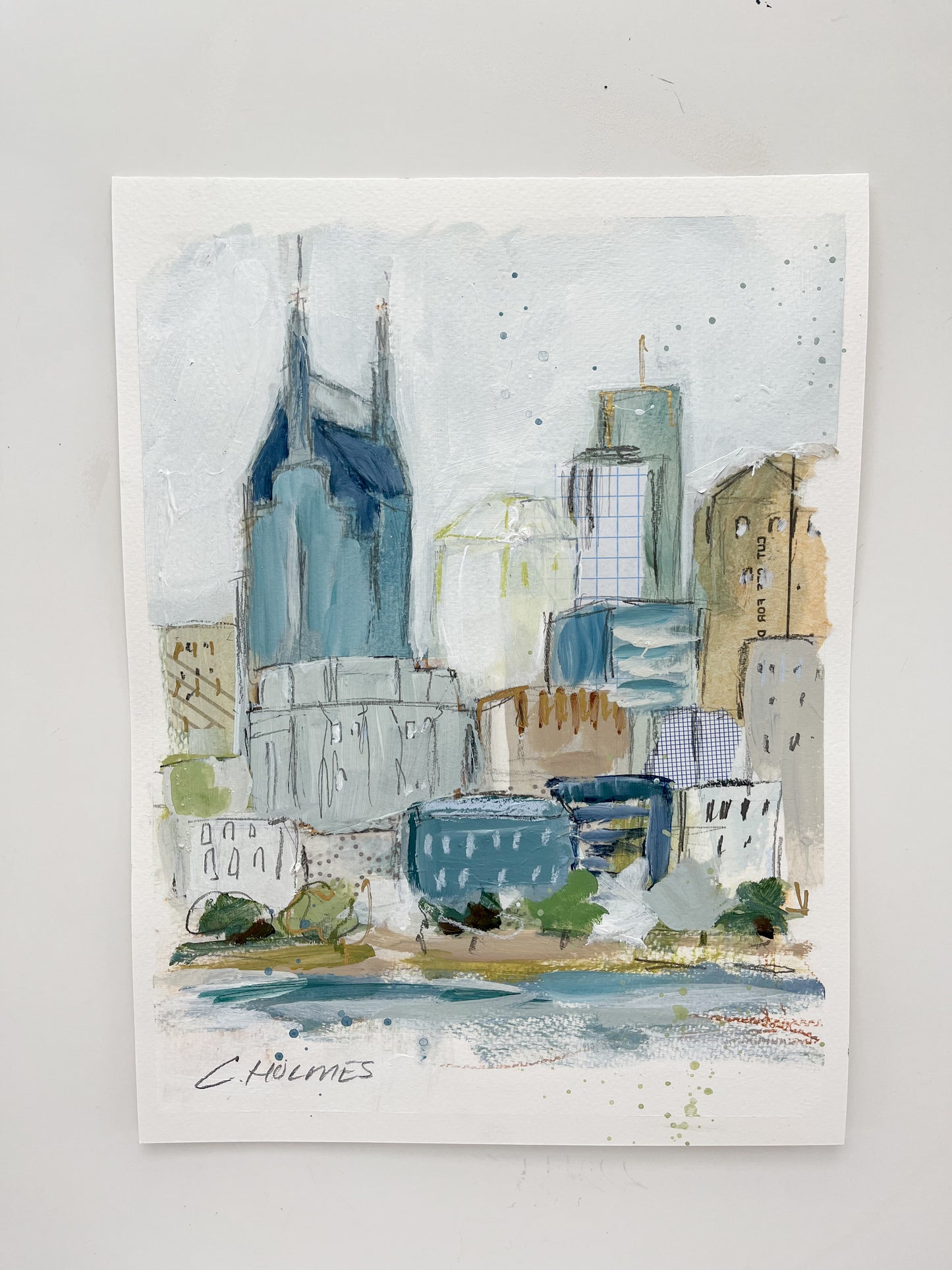 Watercolor and acrylic on paper, 9x12—Nashville skyline with trees, signed by Christy Holmes.