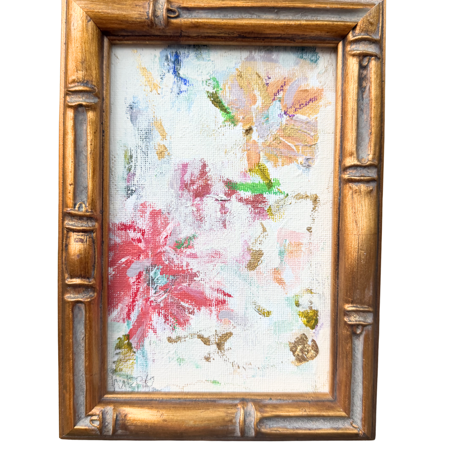 Megan Guidry framed flower art with red, pink, and orange blooms in a gold bamboo frame on white background.