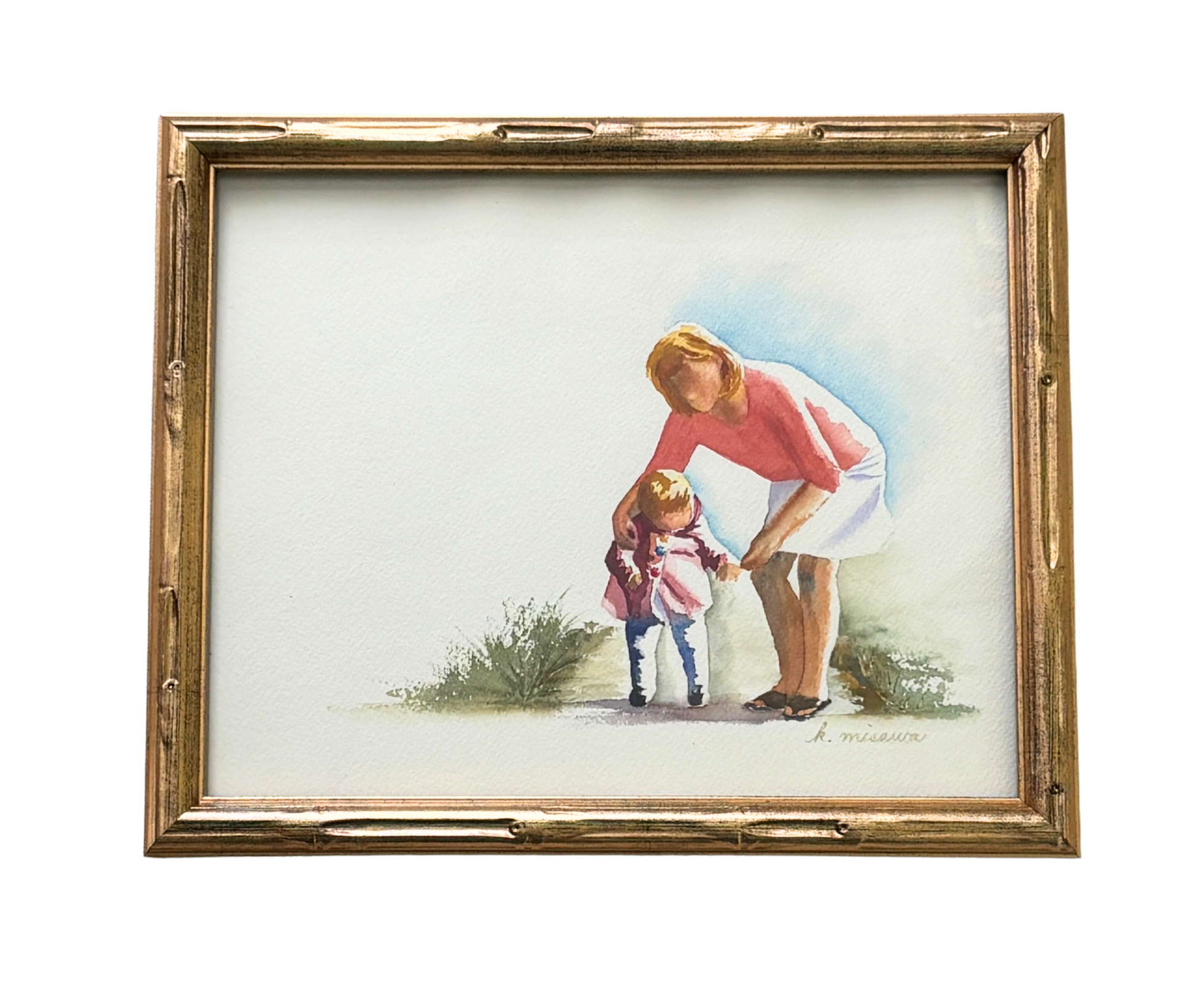 Keri Misawa watercolor art print of a mother helping her child, gold-framed on a white background.