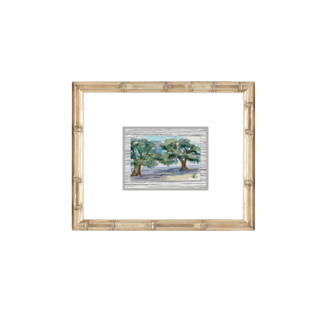 Framed live oak watercolor art with two green trees and blue sky by Elizabeth Sheats Art & Design.