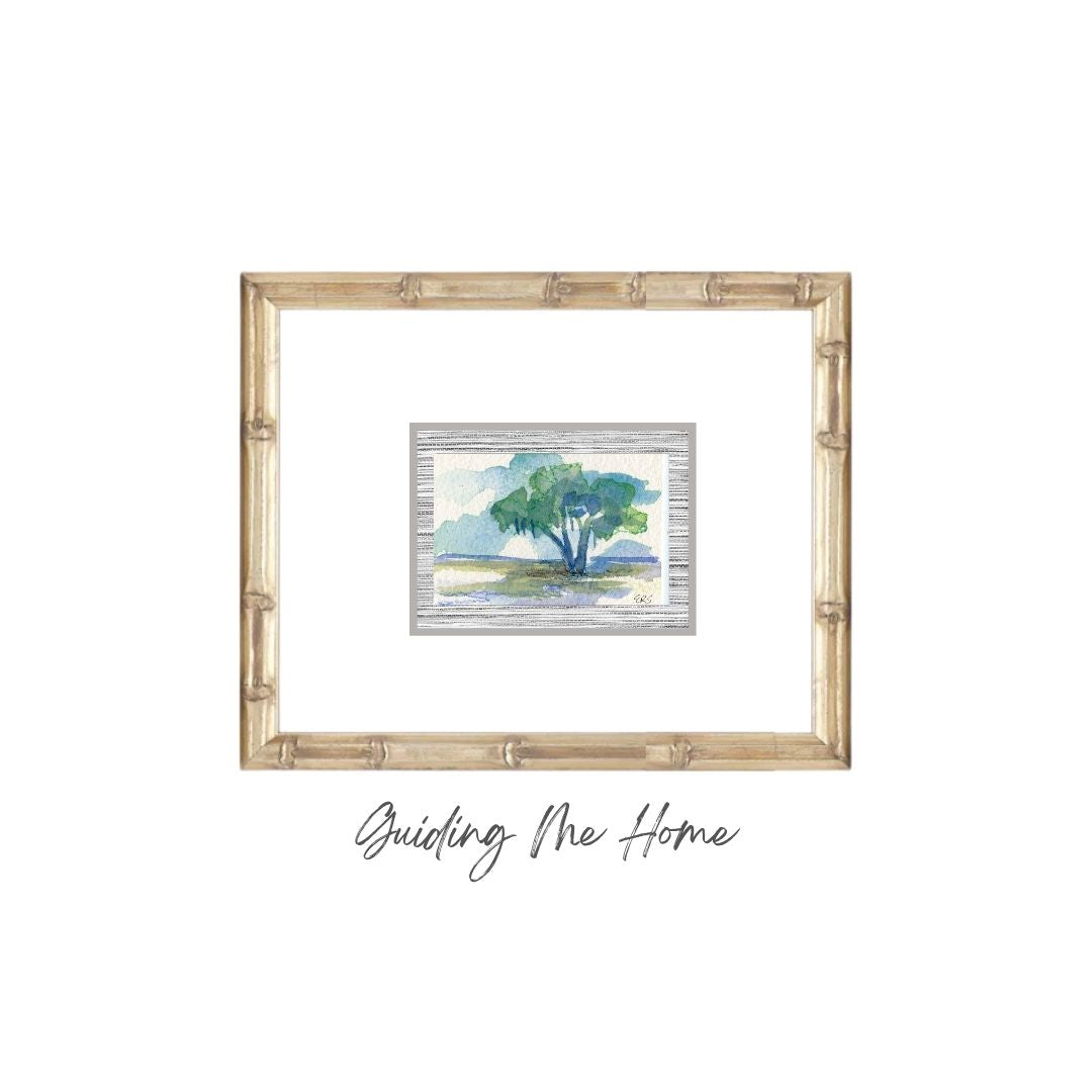 A framed original watercolor of a live oak, “Guiding Me Home,” by Elizabeth Sheats Art & Design.